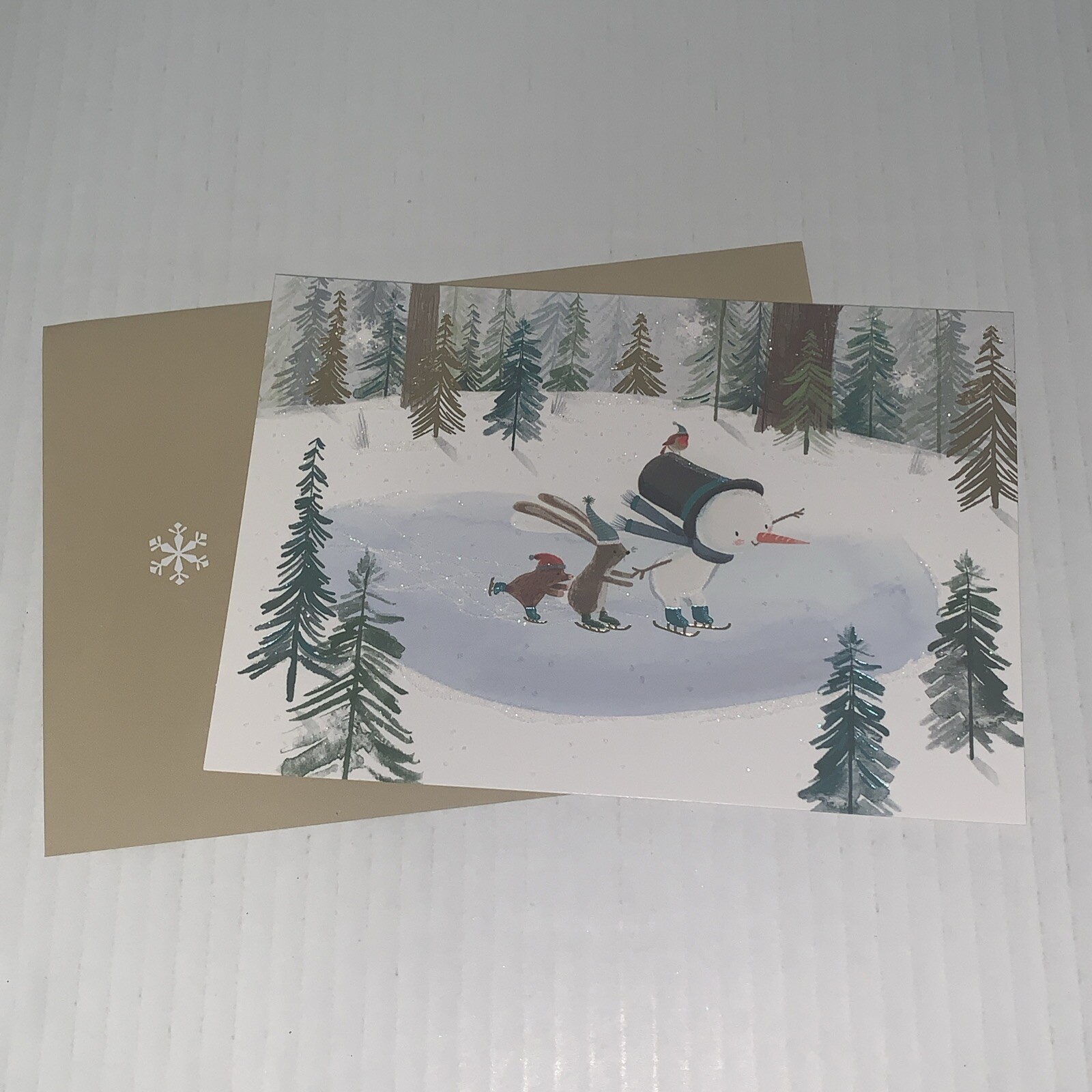 Hallmark Christmas Card: Snowman Skating In Woodland Happiness Headed Your Way