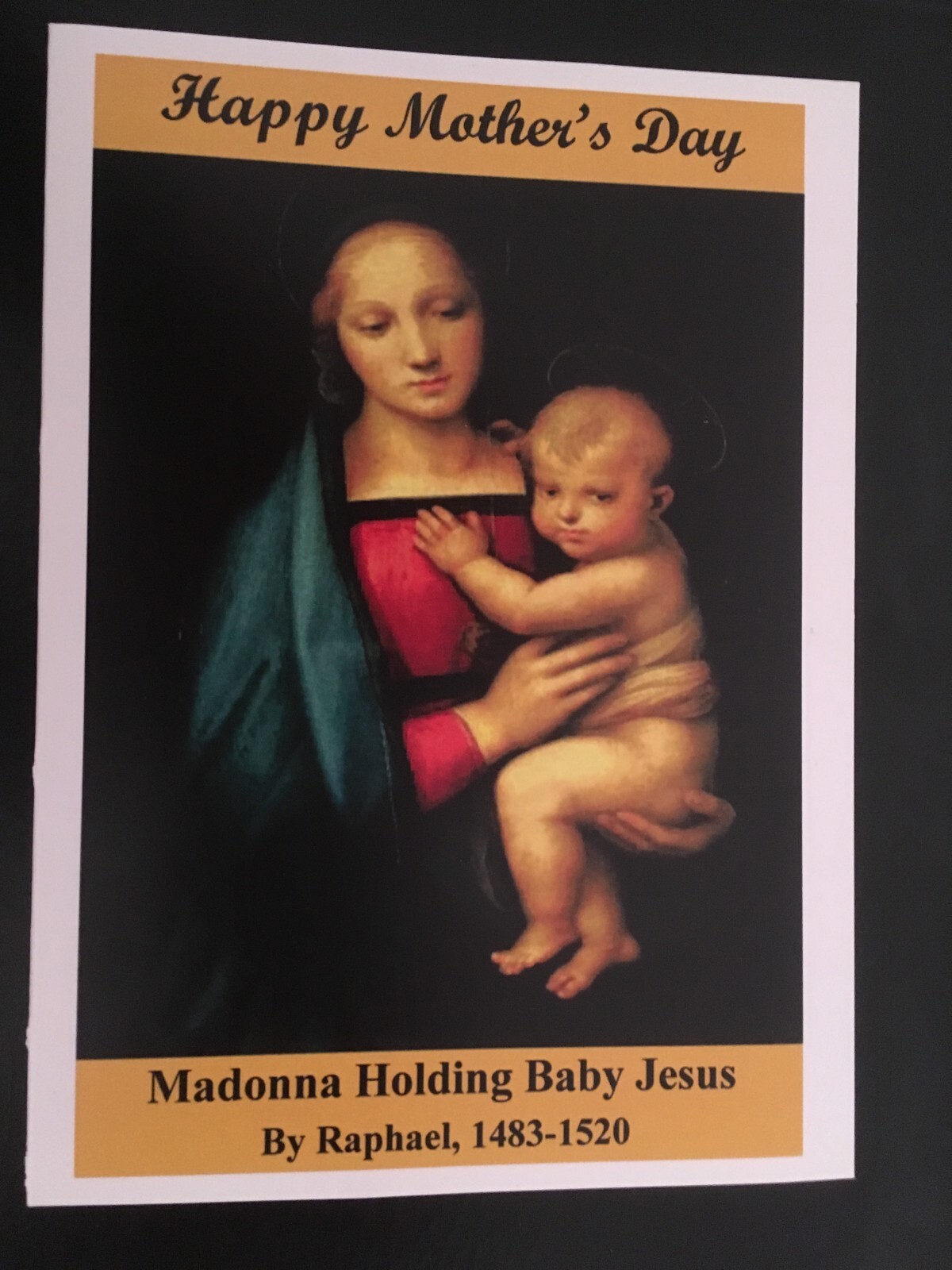 Madonna Holding Baby Jesus by Raphael